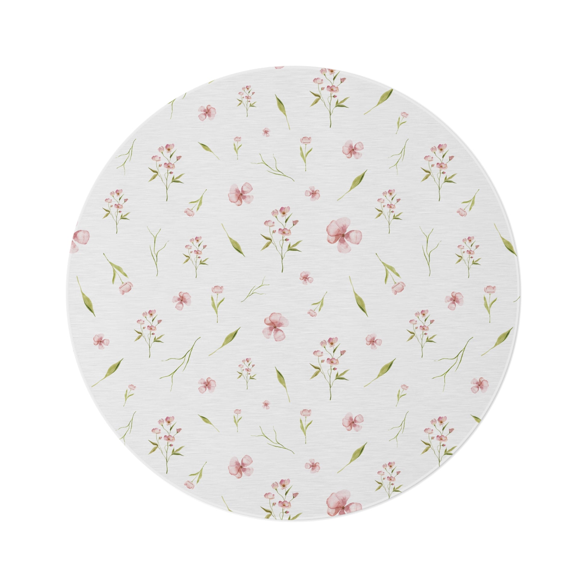 Blush Blossom round nursery rug on a baby girl's bedroom floor