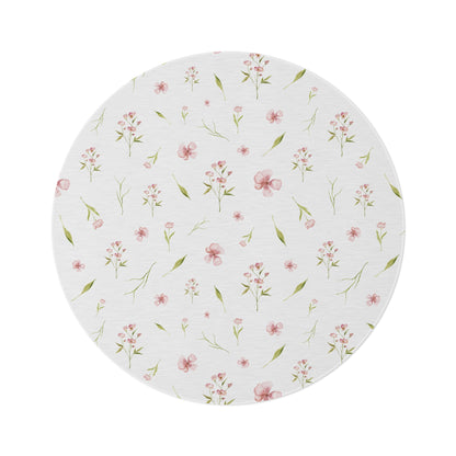 Blush Blossom round nursery rug on a baby girl's bedroom floor