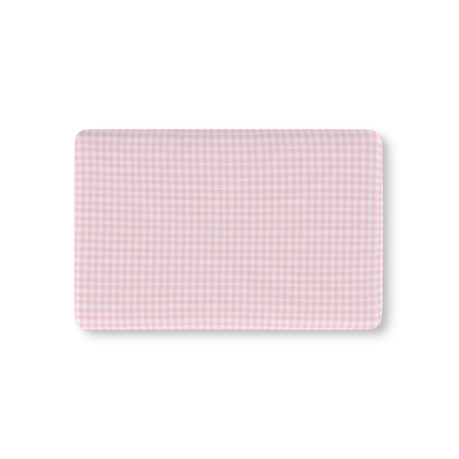 Blush Gingham fitted crib sheet on a nursery crib mattress