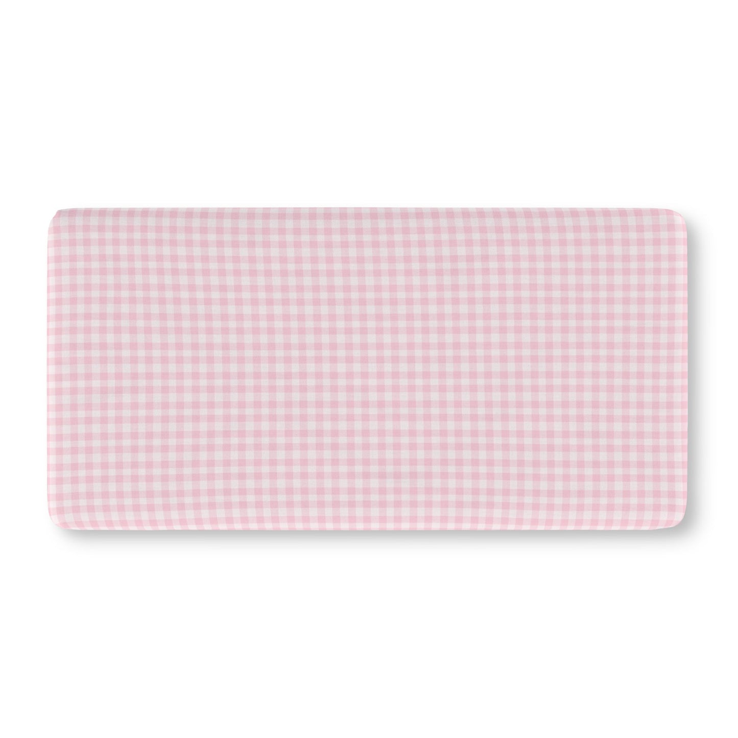 Pink gingham crib sheet on a standard crib mattress
