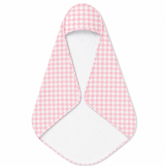 Blush Gingham hooded baby towel wrapped around a baby