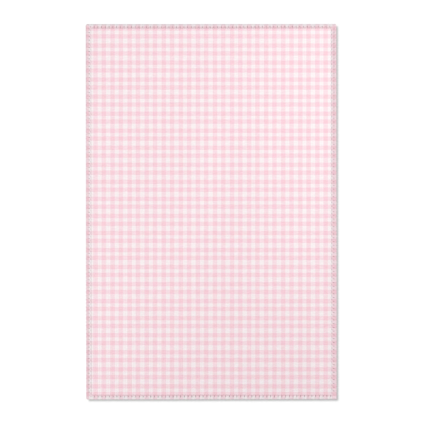 Blush Gingham nursery area rug in a baby girl's bedroom