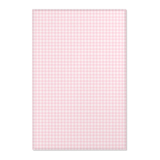 Blush Gingham nursery area rug in a baby girl's bedroom