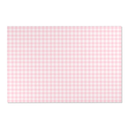 Soft pink check rug defining a nursery play area