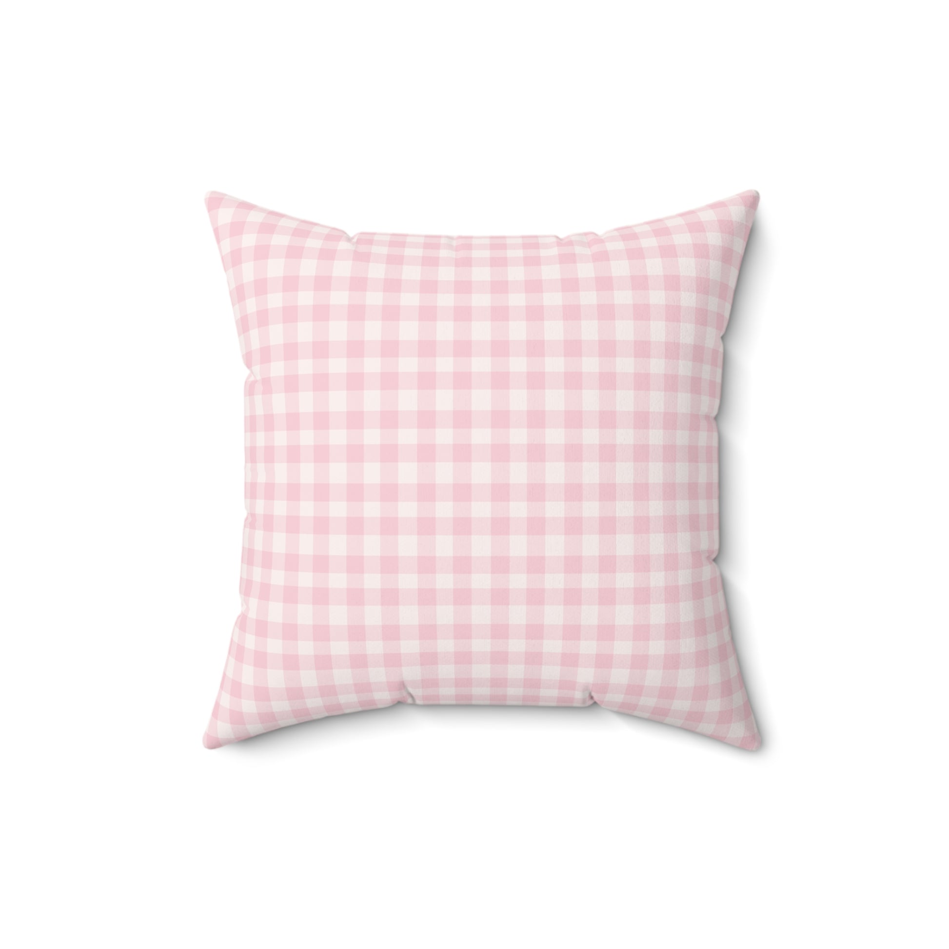 Pink check pillow for a soft pink nursery