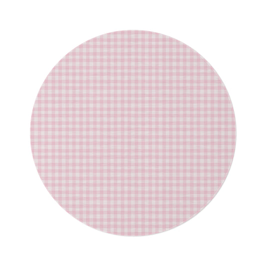 Blush Gingham round nursery rug on a baby room floor