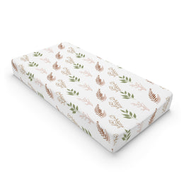Boho Botanical changing pad cover on a nursery changing table