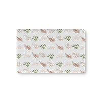 Boho Botanical fitted crib sheet on a nursery crib mattress