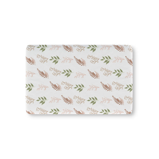 Boho Botanical fitted crib sheet on a nursery crib mattress