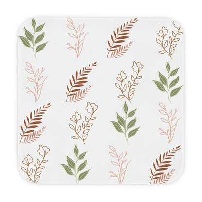 Boho Botanical hooded baby towel wrapped around a baby