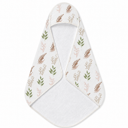 Boho Botanical hooded baby towel wrapped around a baby