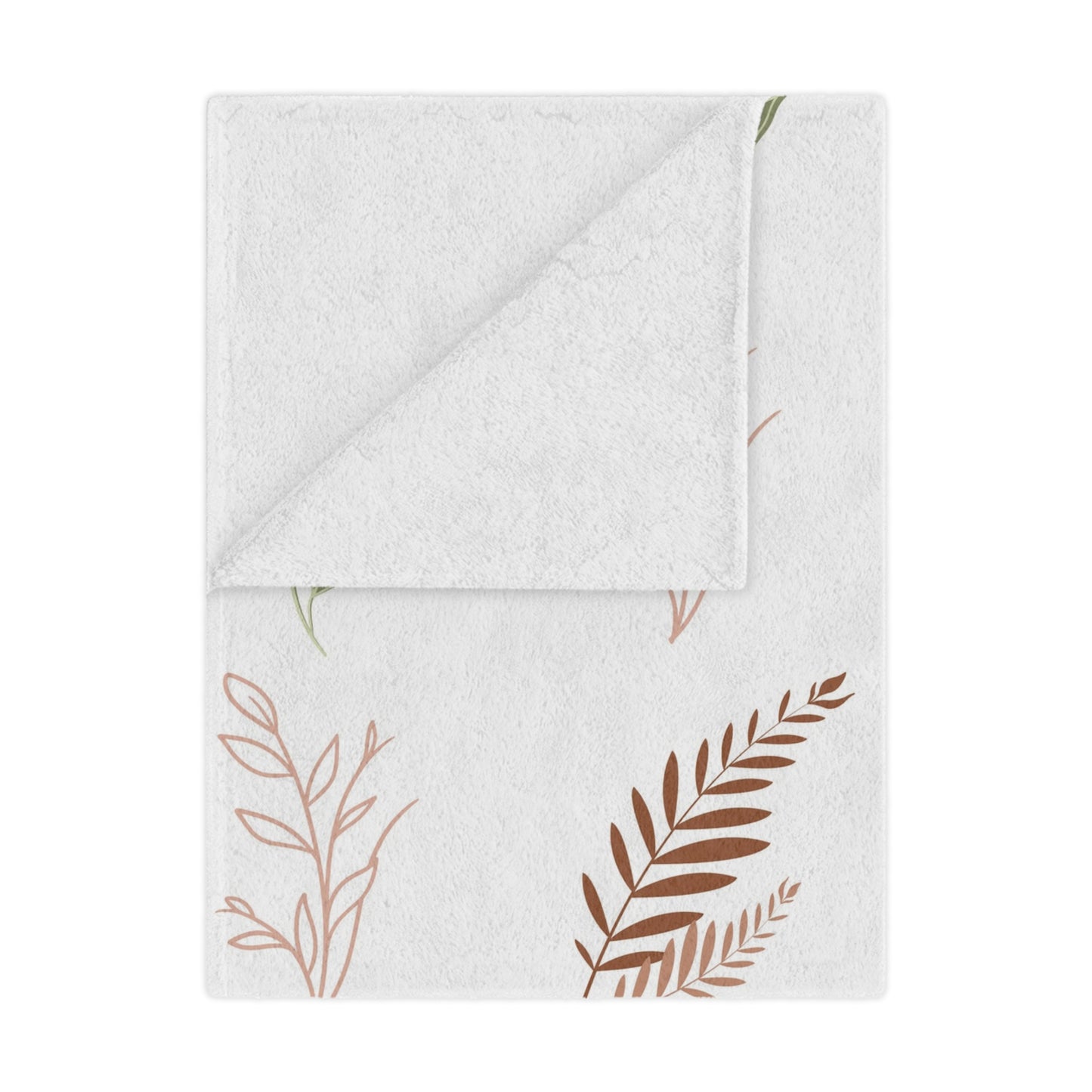 Boho Botanical minky baby blanket draped over a crib