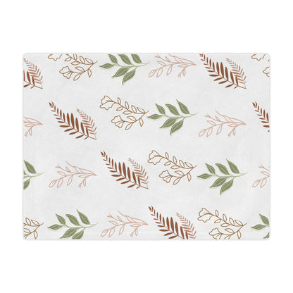 Close detail of the leaf sprig print on the minky baby blanket