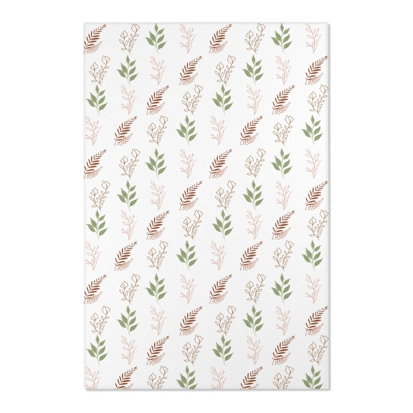 Close detail of the fern print on the nursery area rug