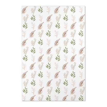 Close detail of the fern print on the nursery area rug