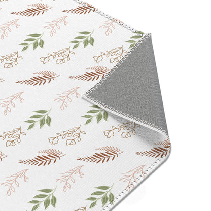 Nursery area rug printed edge to edge with botanical sprigs