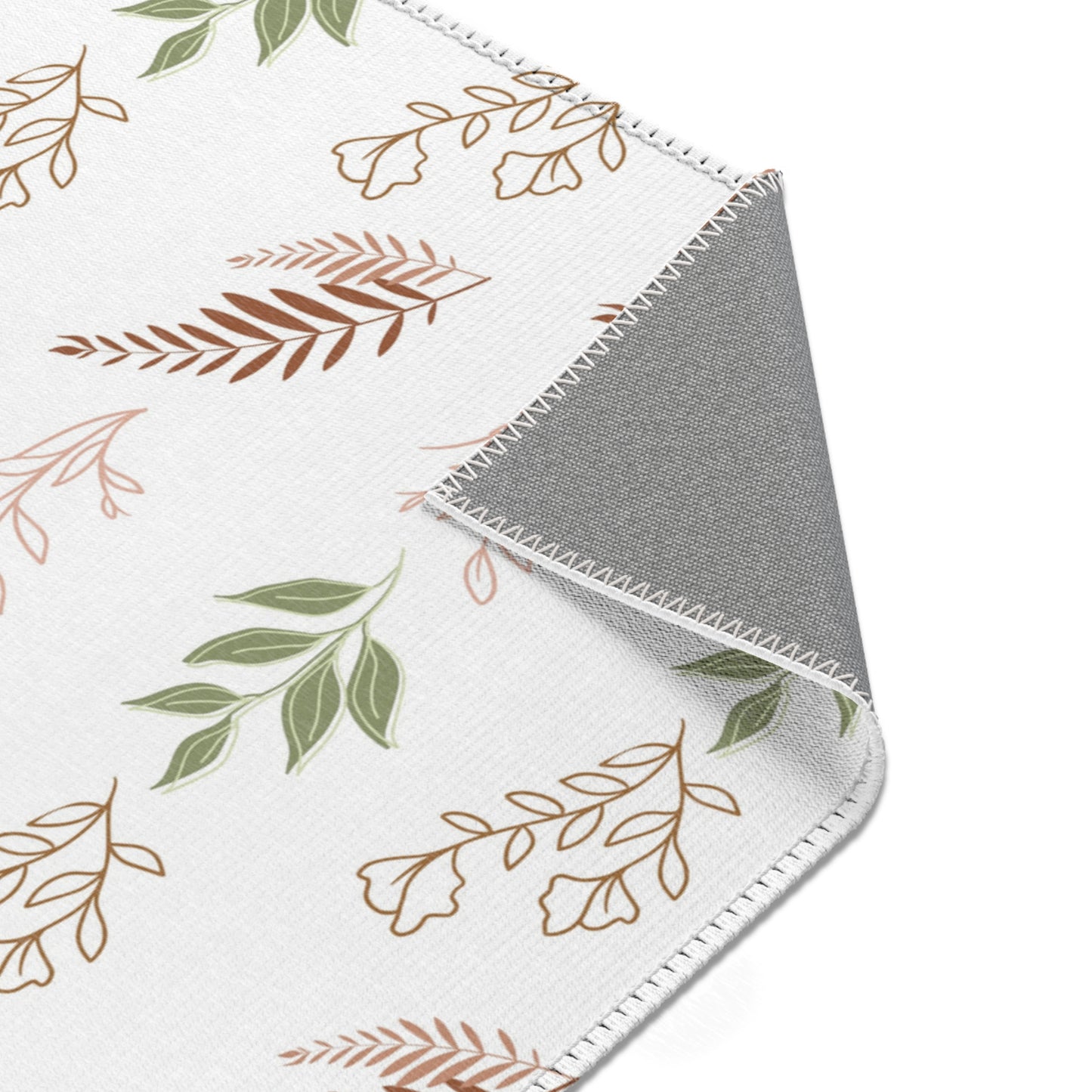 Botanical rug in terracotta, sage and blush on off-white