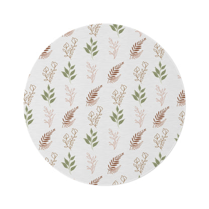 Boho Botanical round nursery rug on a baby room floor