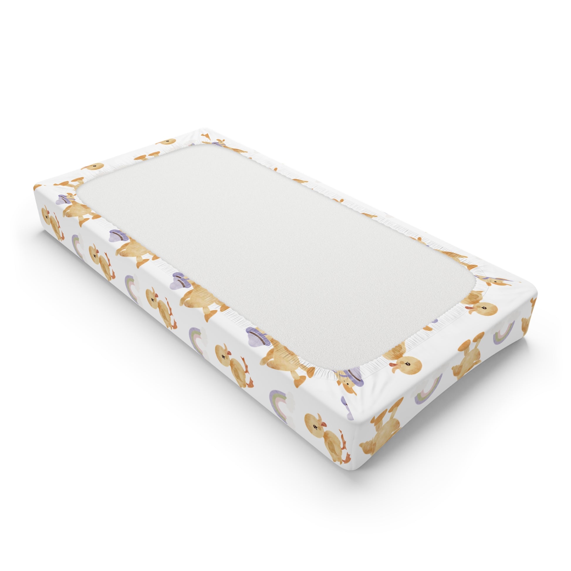 Changing pad cover with yellow ducklings and lilac rainbows