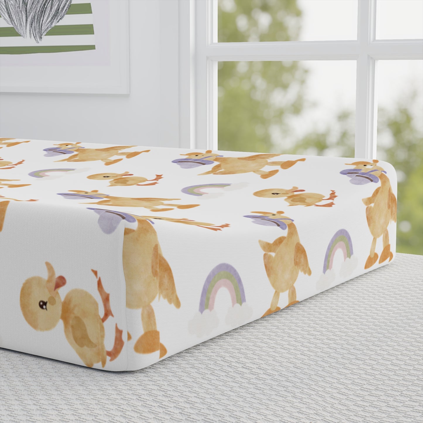 Close detail of the duckling print on the changing pad cover