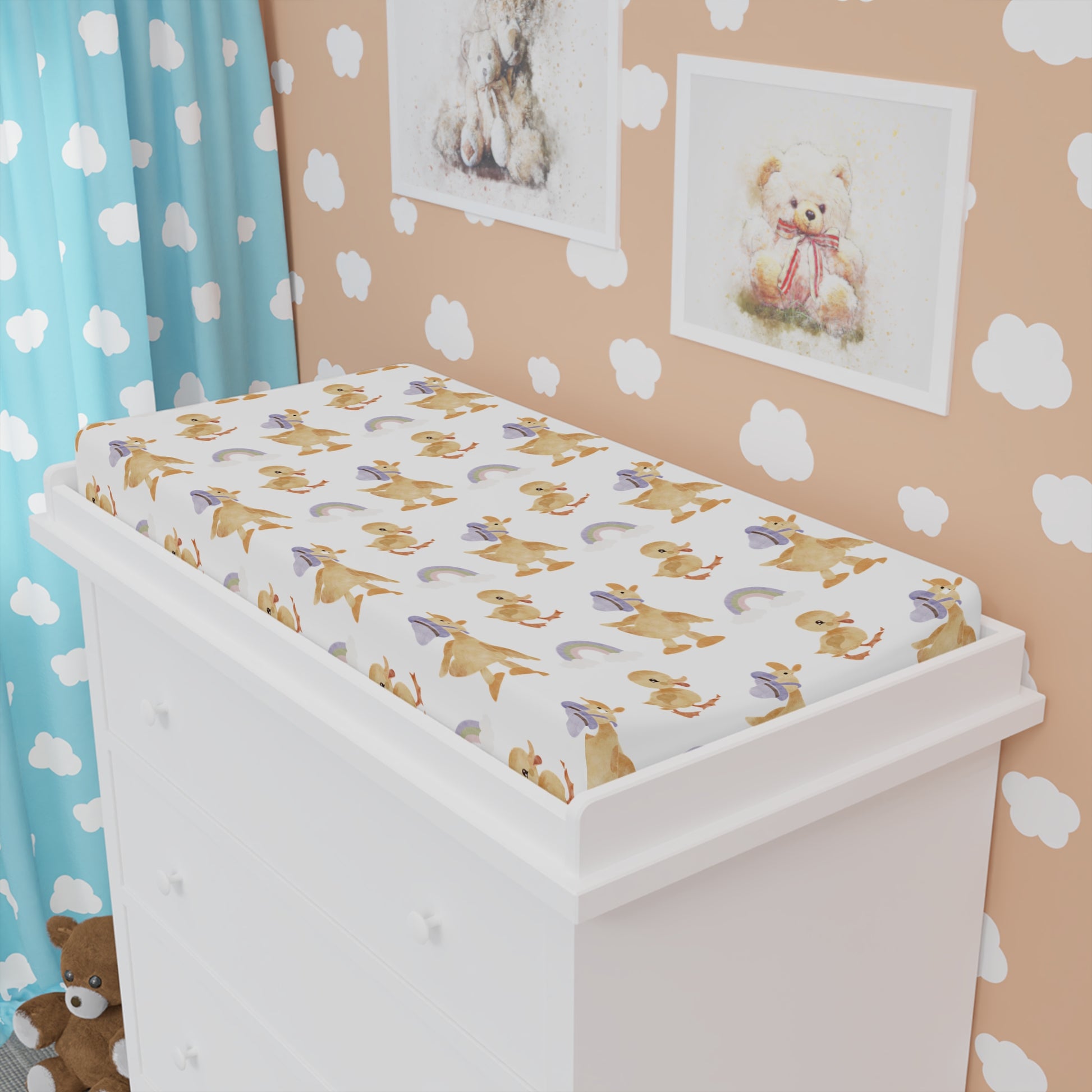 Bonnet Ducklings changing pad cover fitted over a contoured pad