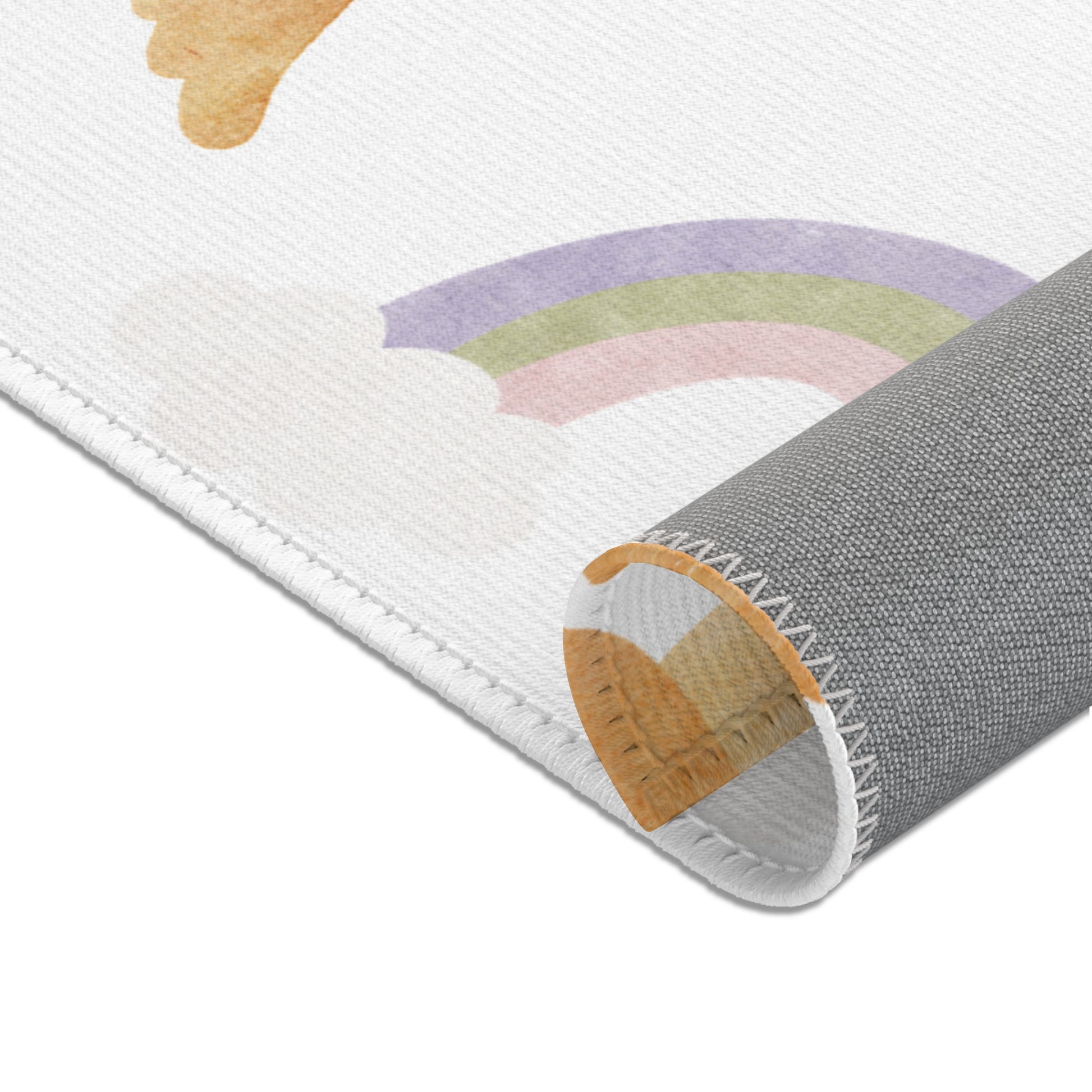 Nursery area rug in a soft yellow, lilac and sage palette
