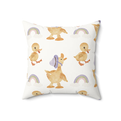 Close detail of the duckling and rainbow print on the pillow