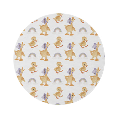 Bonnet Ducklings round nursery rug on a baby room floor