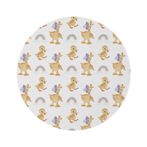 Bonnet Ducklings round nursery rug on a baby room floor