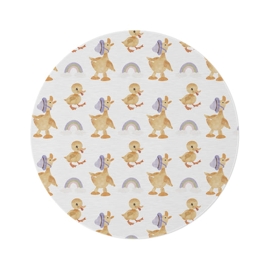 Bonnet Ducklings round nursery rug on a baby room floor