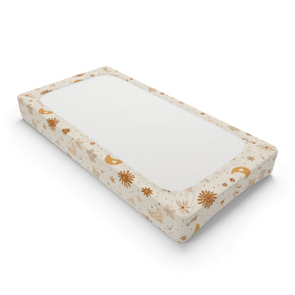 Changing pad cover with gold moons, daisies and stars on cream