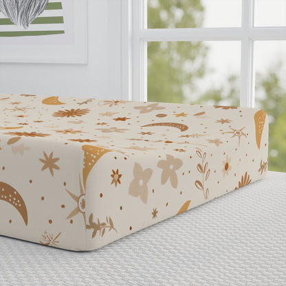 Close detail of the Celestial Bloom print on the changing pad cover