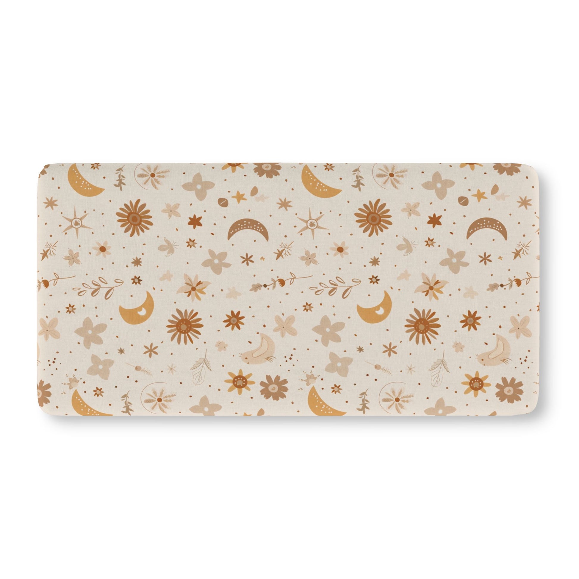 Fitted crib sheet with golden moons and rust florals on cream
