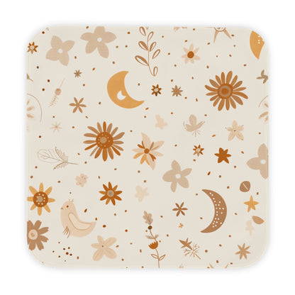 Celestial Bloom hooded baby towel wrapped around a baby