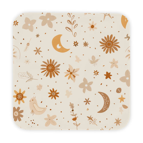 Celestial Bloom hooded baby towel wrapped around a baby