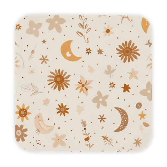Celestial Bloom hooded baby towel wrapped around a baby