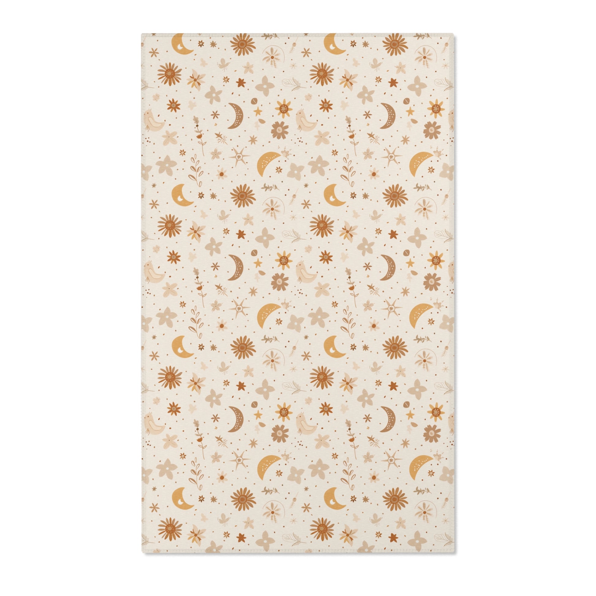 Moon and floral nursery area rug in gold, rust and tan