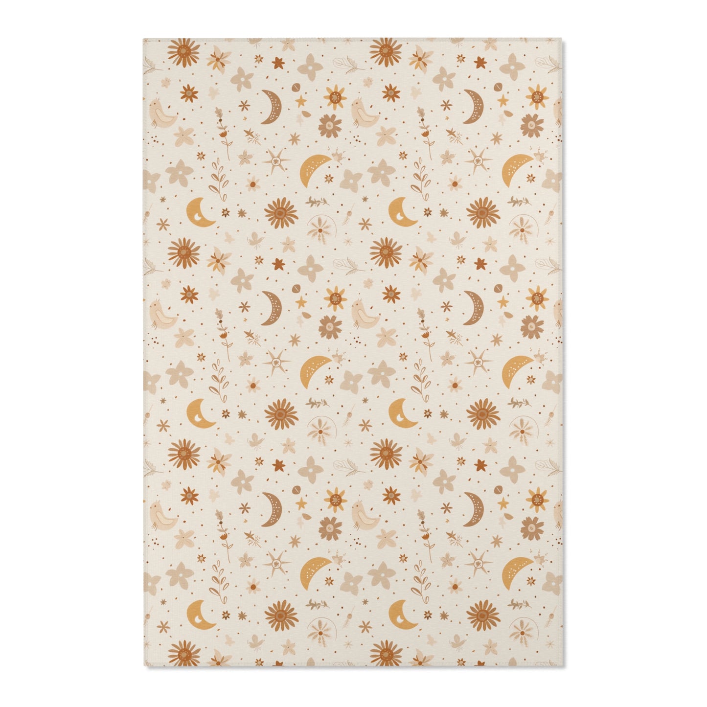 Close detail of the moons and daisies on the nursery area rug