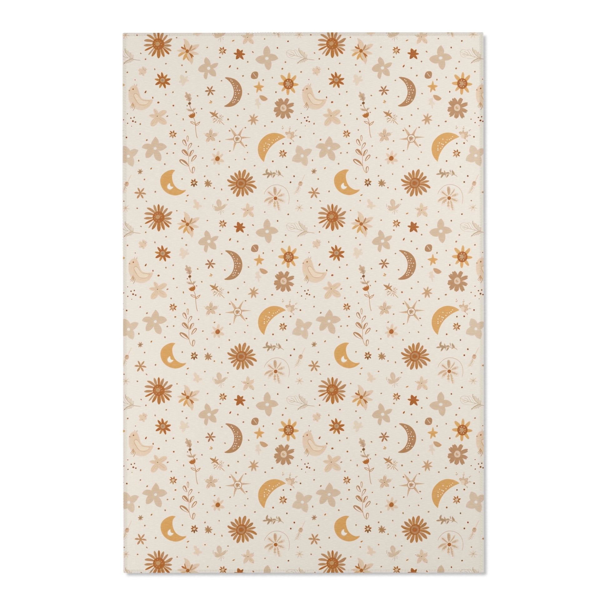 Close detail of the moons and daisies on the nursery area rug