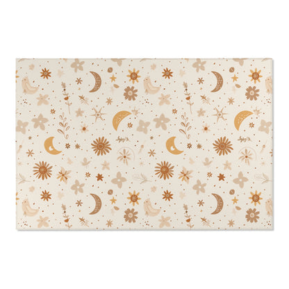 Low pile nursery rug with golden moons and rust florals