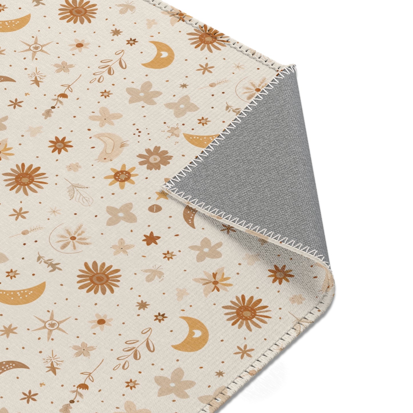 Nursery area rug printed edge to edge with moons and flowers