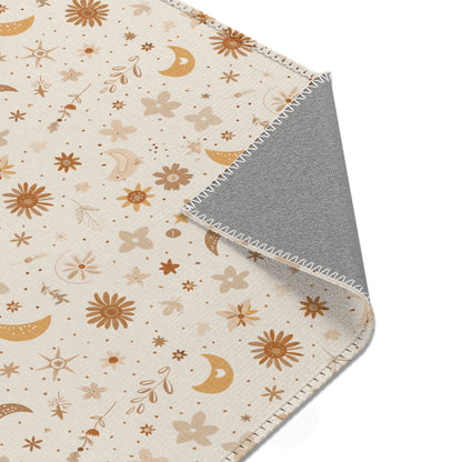 Nursery area rug printed edge to edge with moons and flowers