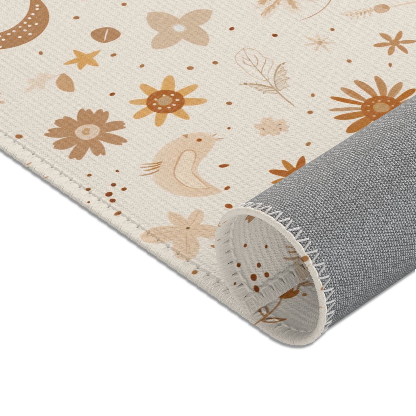Scattered moons, daisies and stars printed across the area rug
