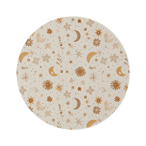 Celestial Bloom round nursery rug on a baby room floor