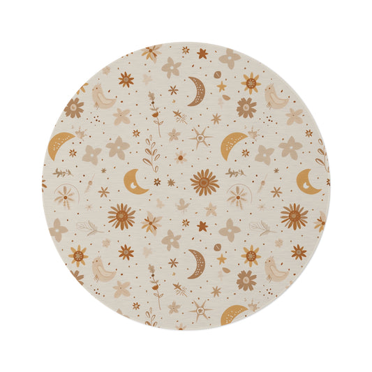 Celestial Bloom round nursery rug on a baby room floor