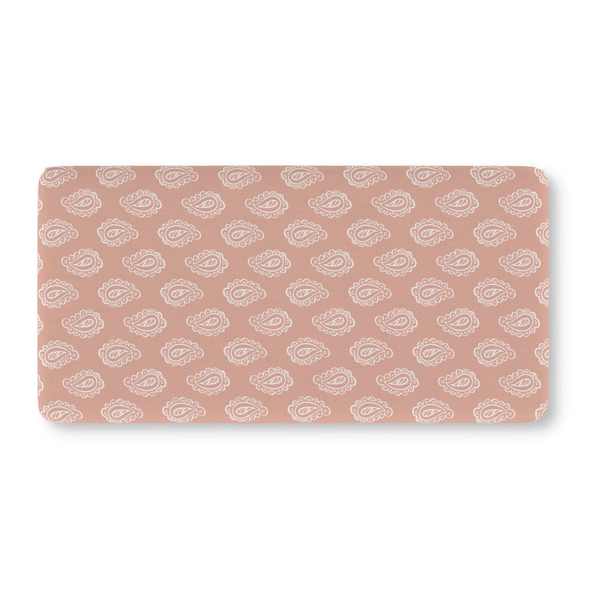 Fitted crib sheet in cream paisley on dusty clay rose
