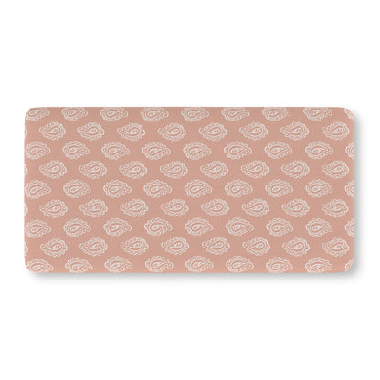 Fitted crib sheet in cream paisley on dusty clay rose