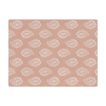 Close detail of the scalloped paisley print on the minky blanket