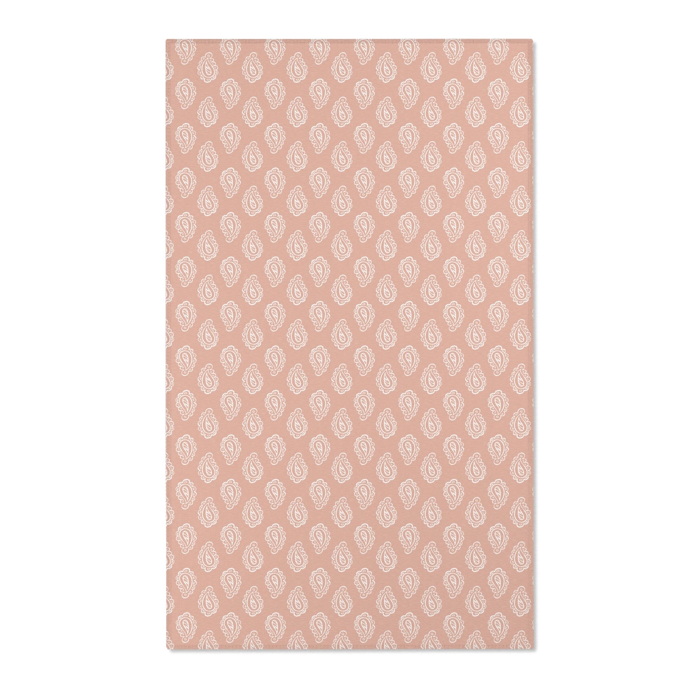 Paisley nursery area rug in cream on dusty clay rose