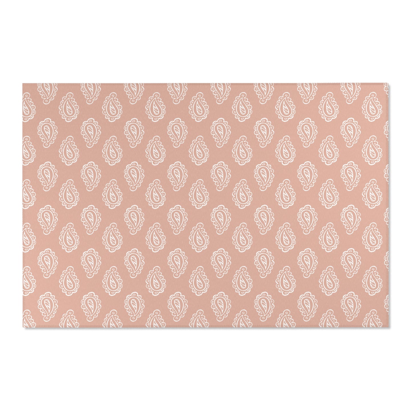 Low pile nursery rug with cream paisley on a rose ground